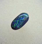 A839 - Oval cut black opal beauty
