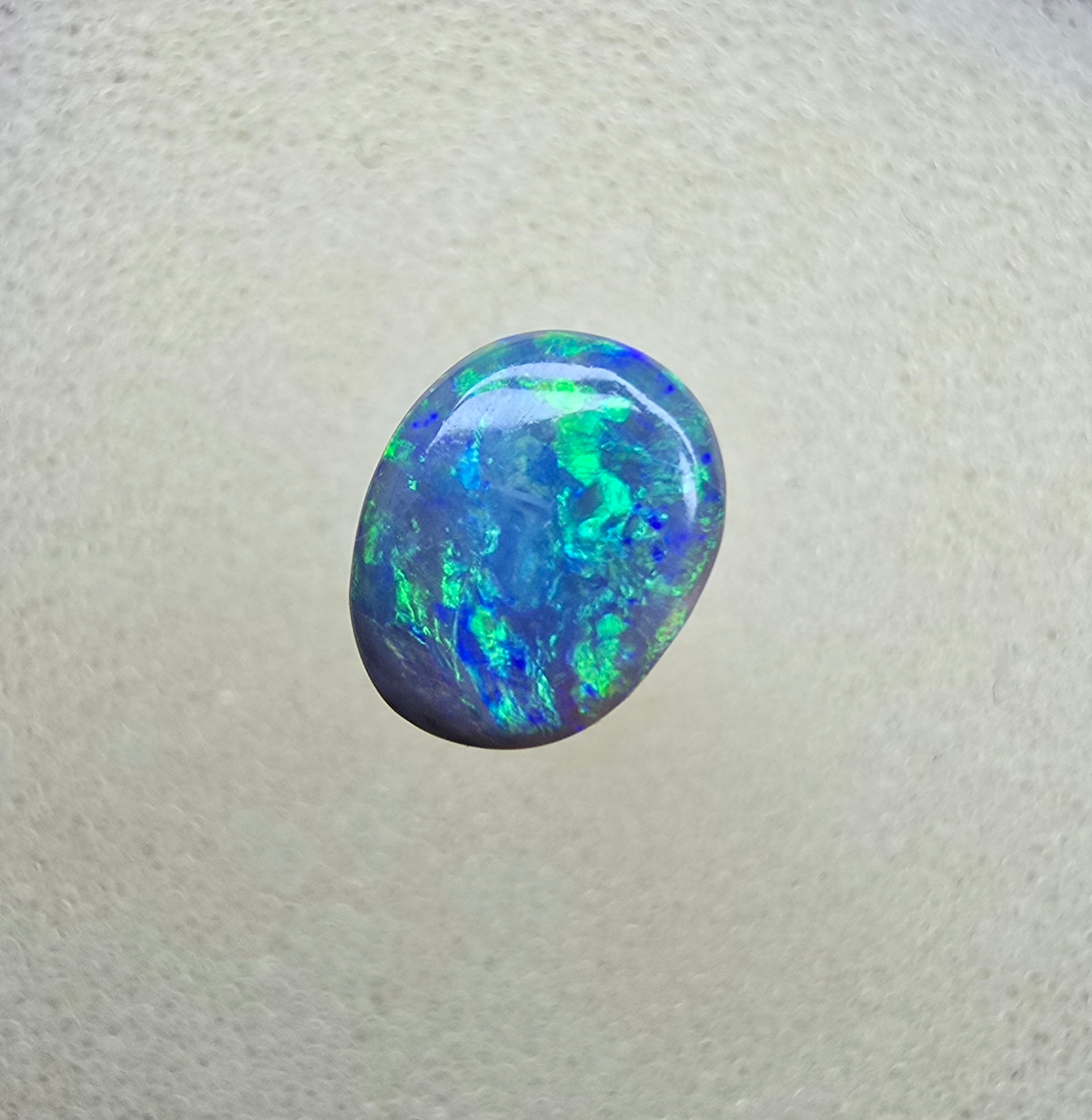 A841 - Bright oval cut black opal