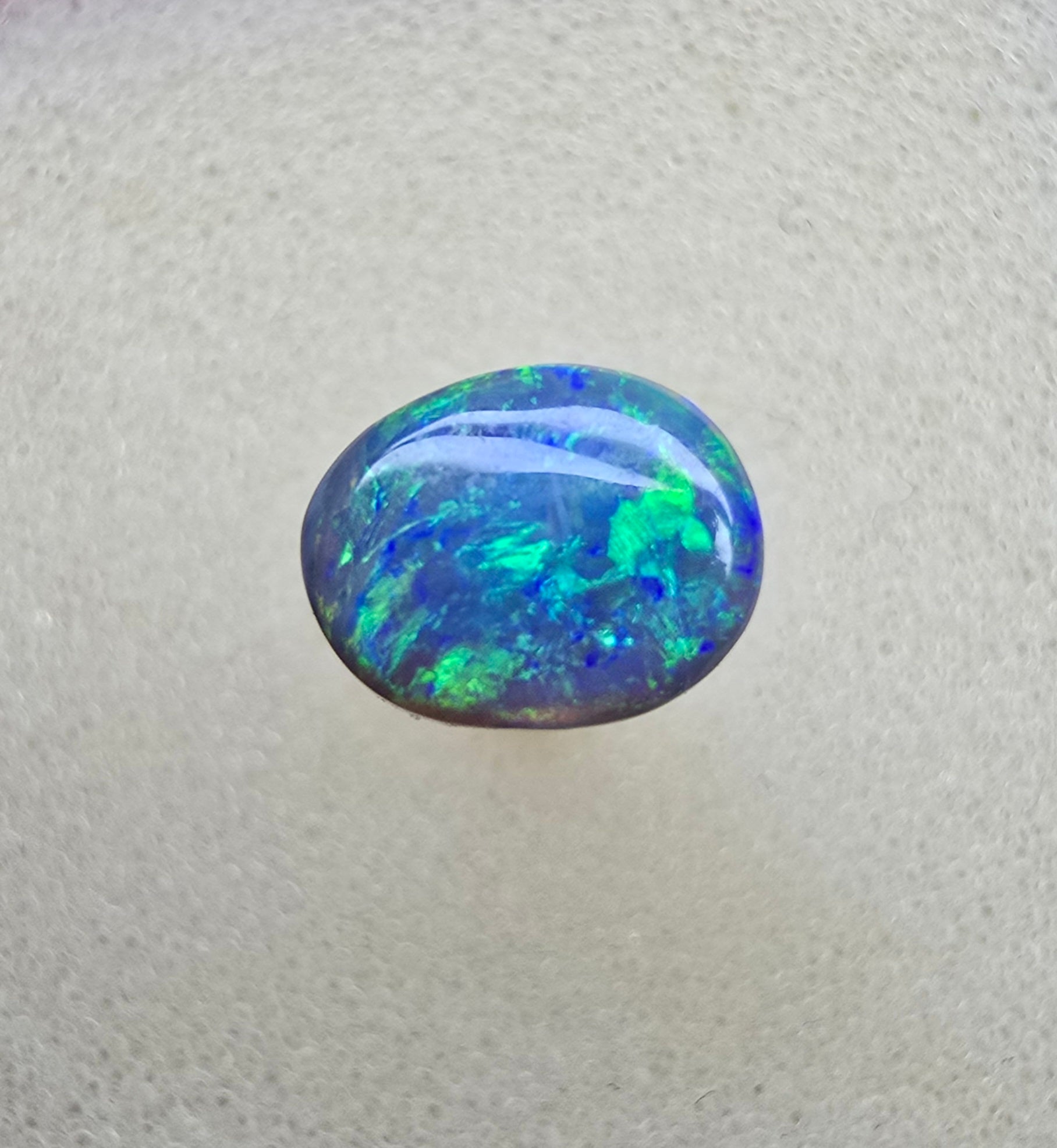A841 - Bright oval cut black opal