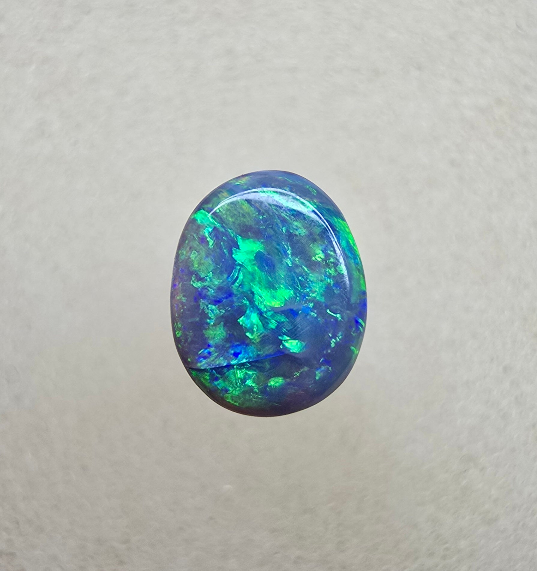 A841 - Bright oval cut black opal