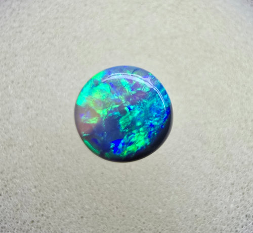 A845 - Round cut gem black opal