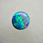 A845 - Round cut gem black opal