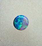 A845 - Round cut gem black opal