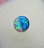 A845 - Round cut gem black opal