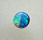 A845 - Round cut gem black opal