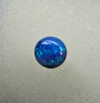 A865 - Round cut 3D blue on black