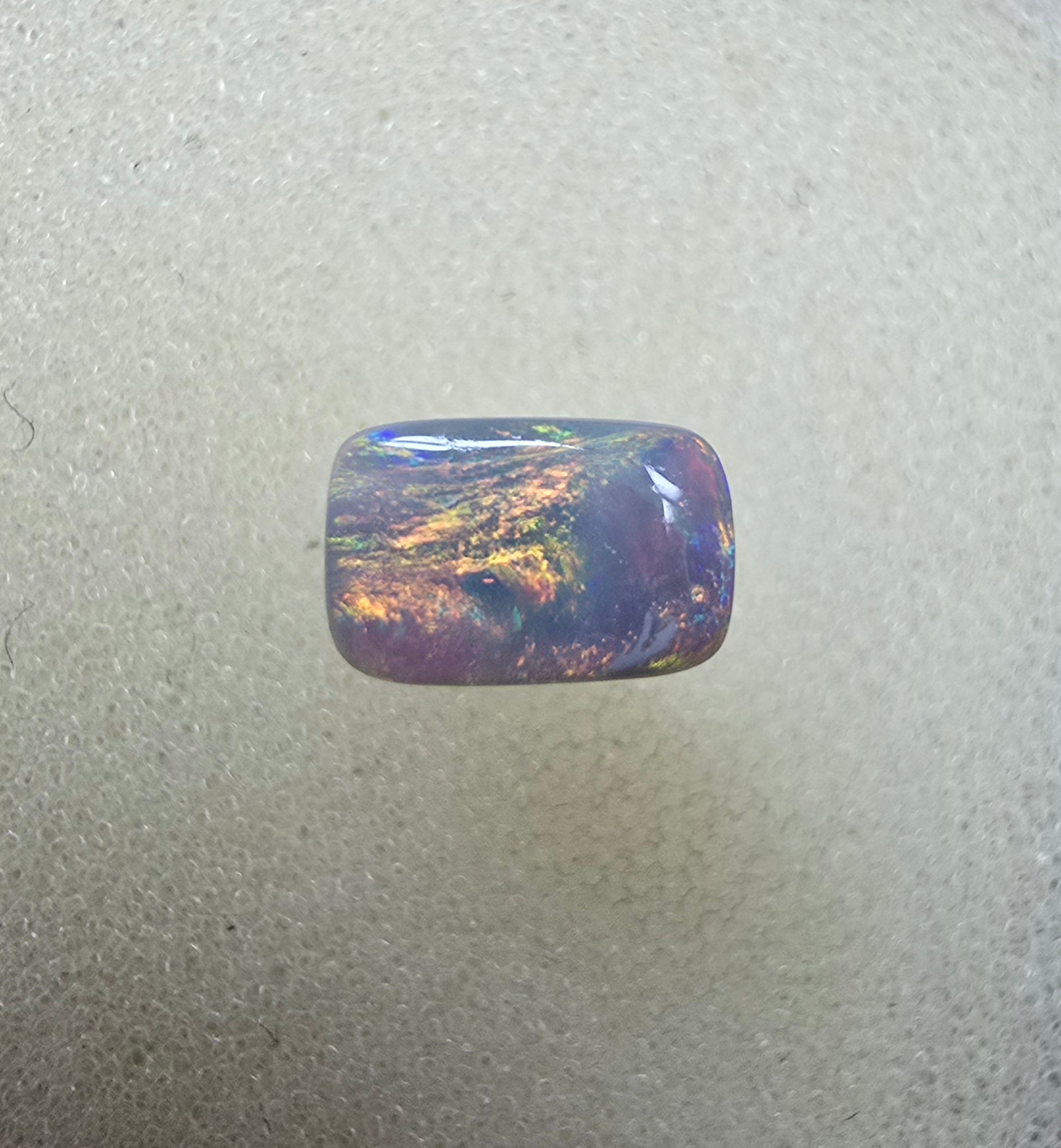 A888 - Bright rectangle cut dark opal