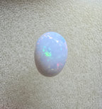 A889 - Pearl white round cut opal