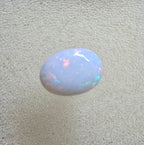 A889 - Pearl white round cut opal