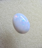 A889 - Pearl white round cut opal