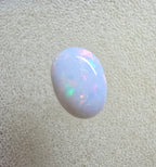 A889 - Pearl white round cut opal
