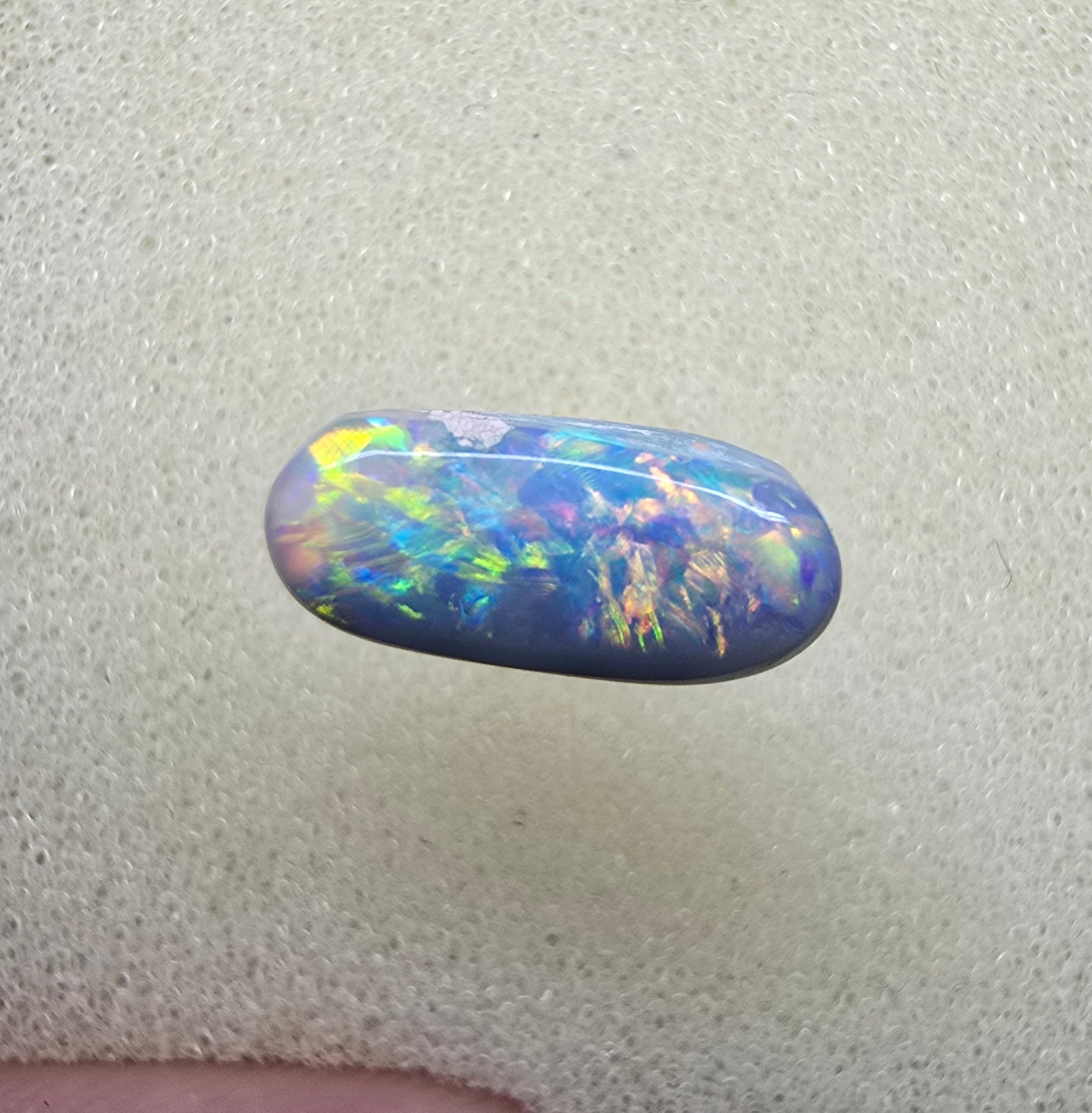 A894 - Oval cut dark crystal opal