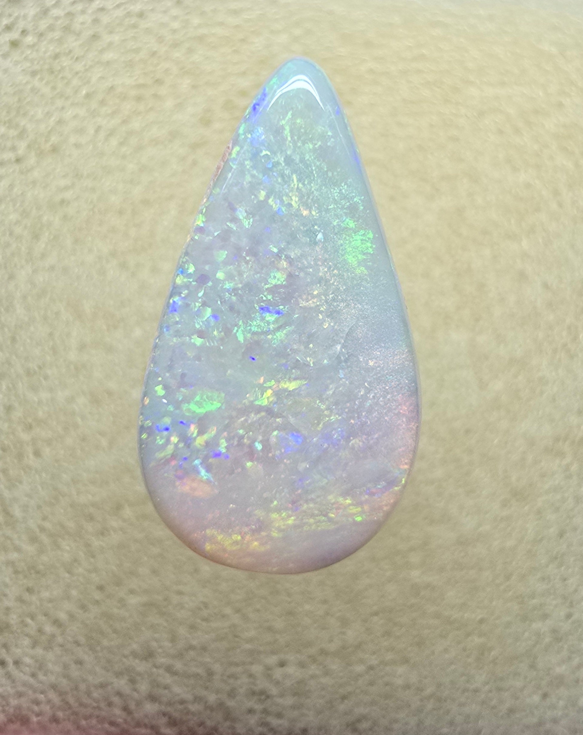 A910 - Bold drop cut white opal.