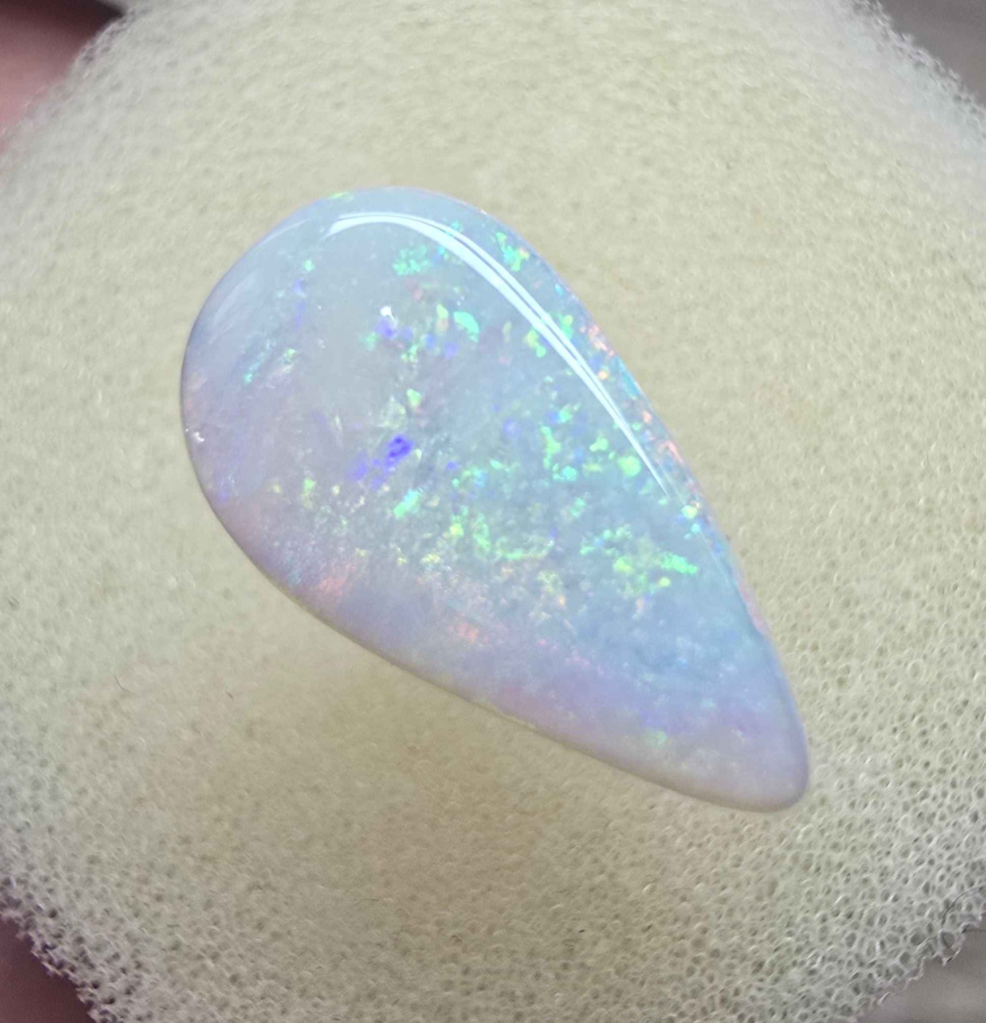 A910 - Bold drop cut white opal.
