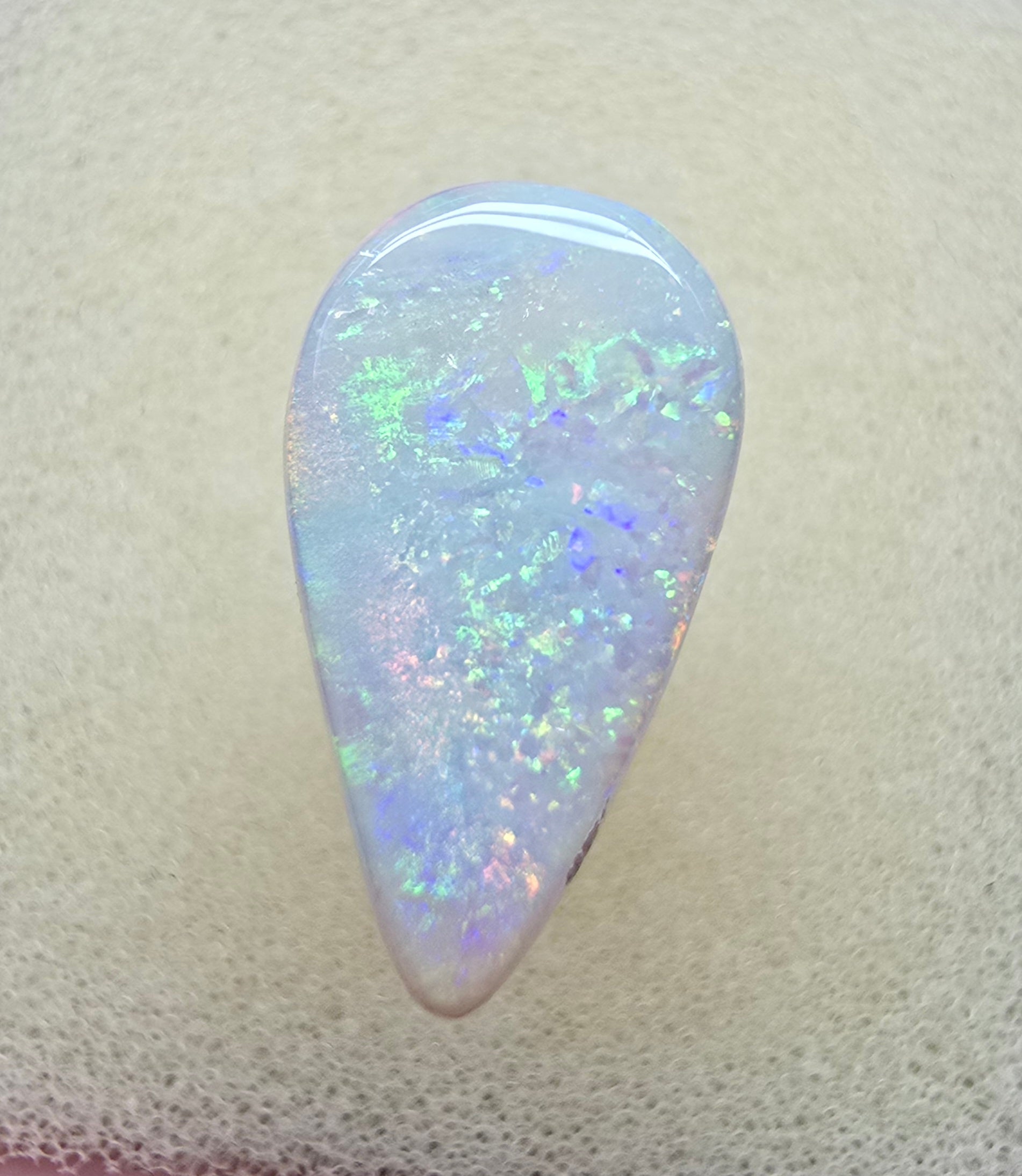 A910 - Bold drop cut white opal.