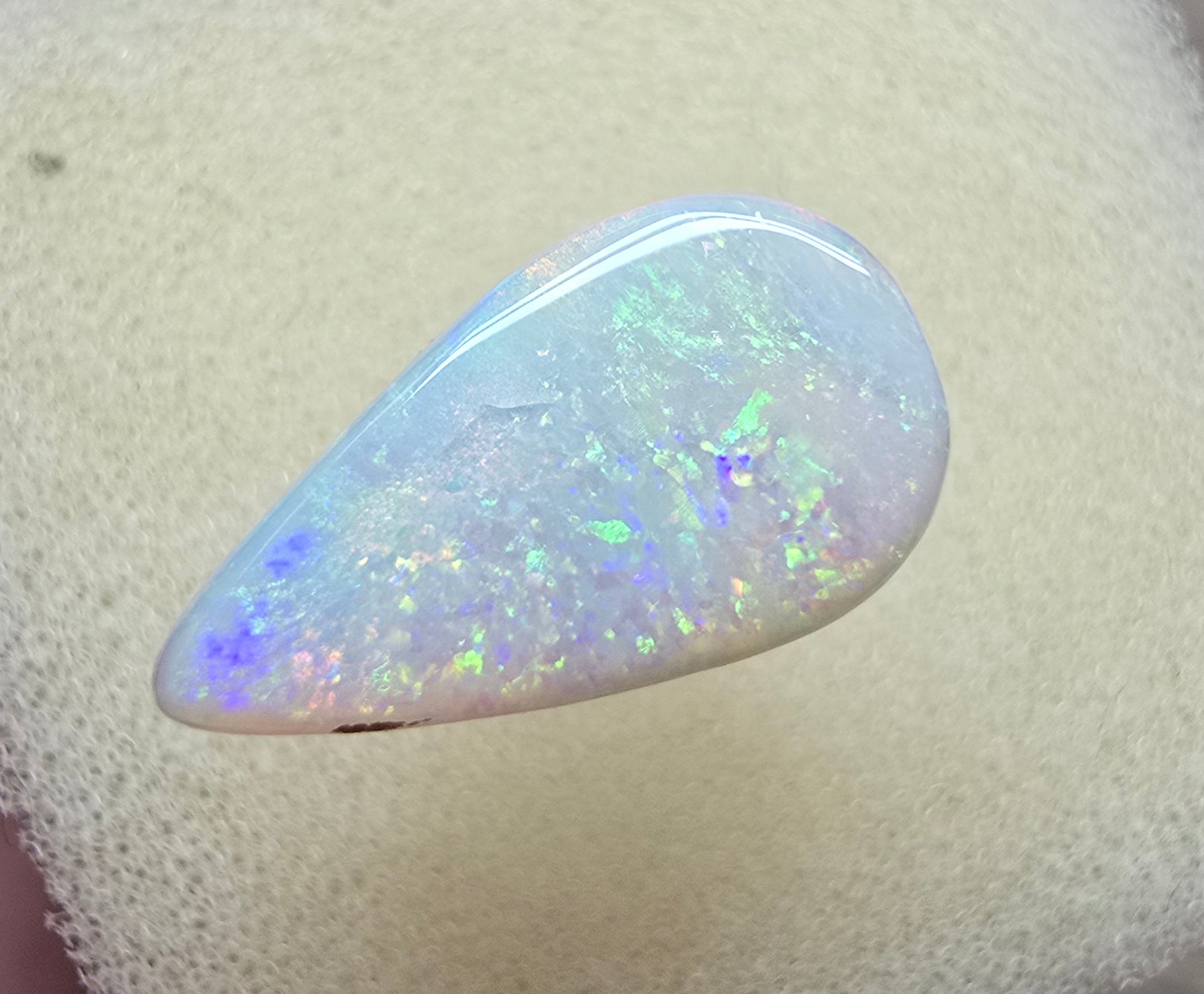 A910 - Bold drop cut white opal.