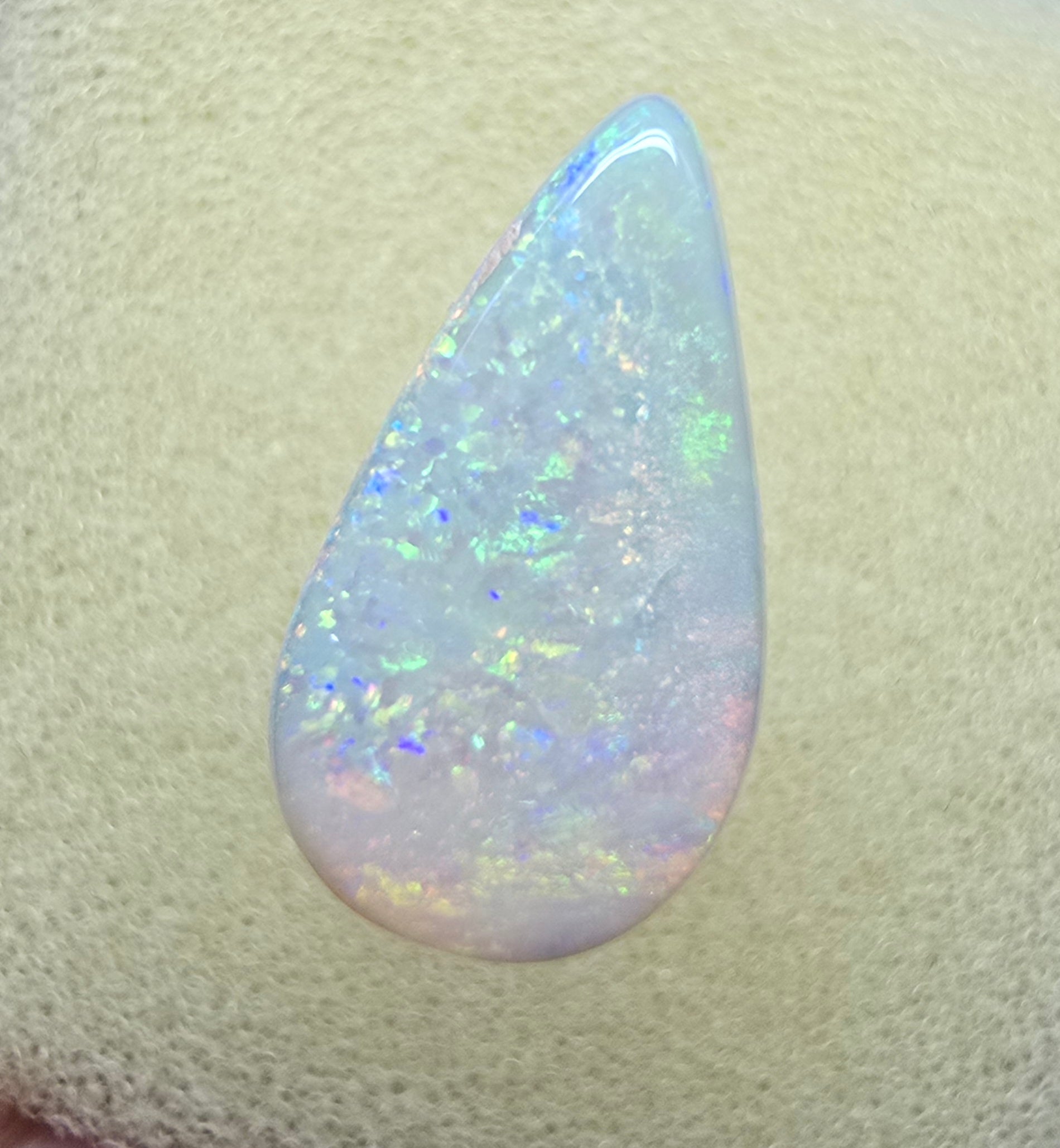 A910 - Bold drop cut white opal.