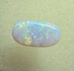 A911 - Oval cut bright red fire white opal