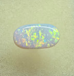 A911 - Oval cut bright red fire white opal