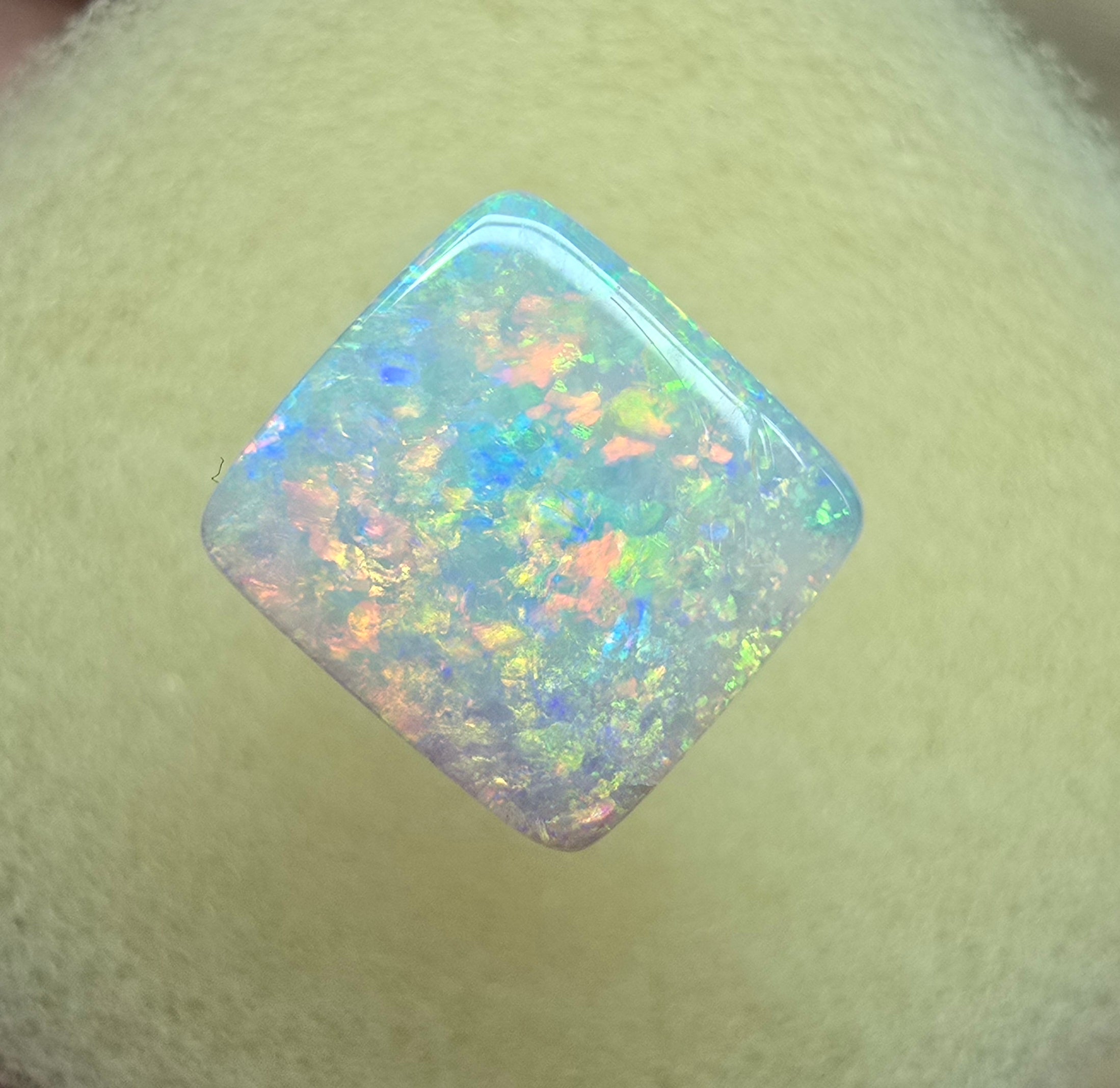 A912 - Brilliant cushion cut gem white opal