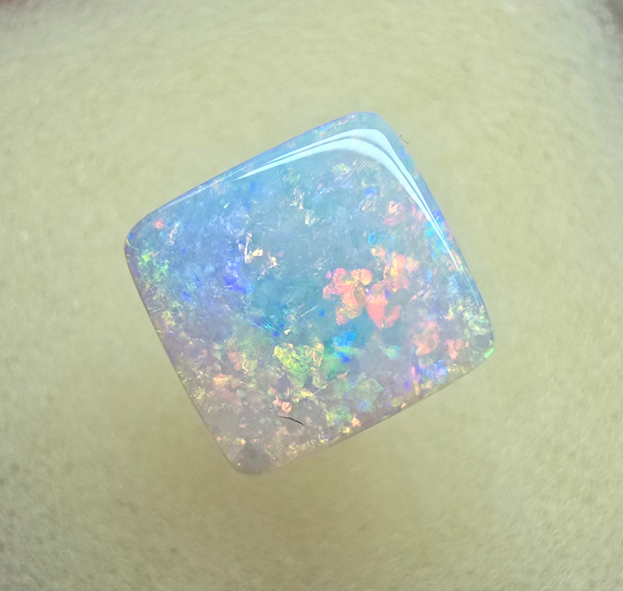 A912 - Brilliant cushion cut gem white opal