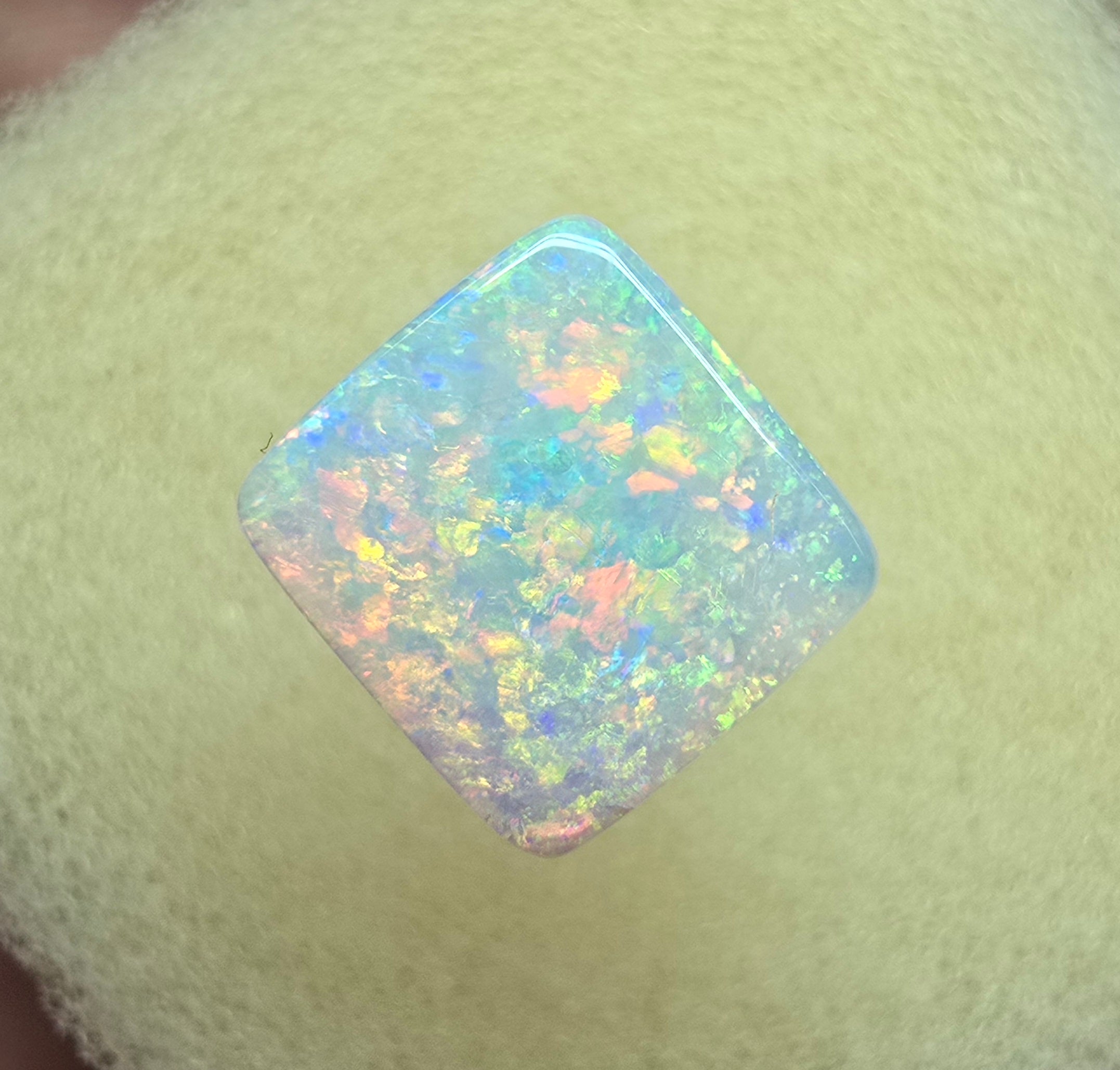 A912 - Brilliant cushion cut gem white opal