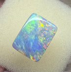 A940 - Stunning broad face cushion cut dark opal.