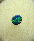 A945 - Bright black opal round cut