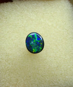 A945 - Bright black opal round cut