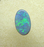 A946 - Bright and flashy oval cut dark opal