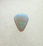 A960 - Sparkly green drop cut white opal