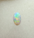 A963 - Bright round cut crystal opal.
