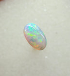A963 - Bright round cut crystal opal.