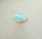 A963 - Bright round cut crystal opal.