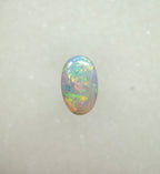 A963 - Bright round cut crystal opal.