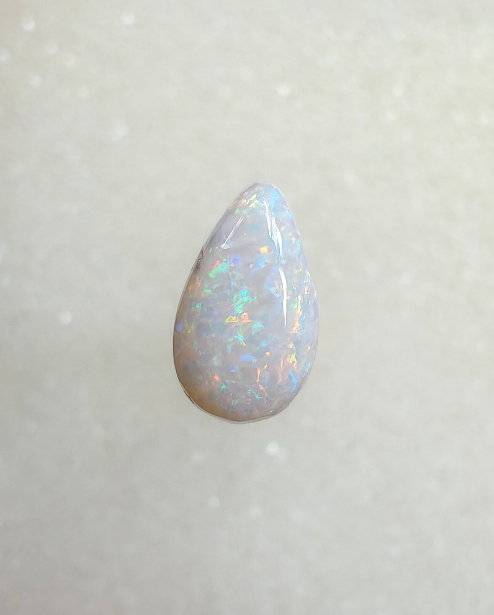 A964 - Sparkly drop cut white opal