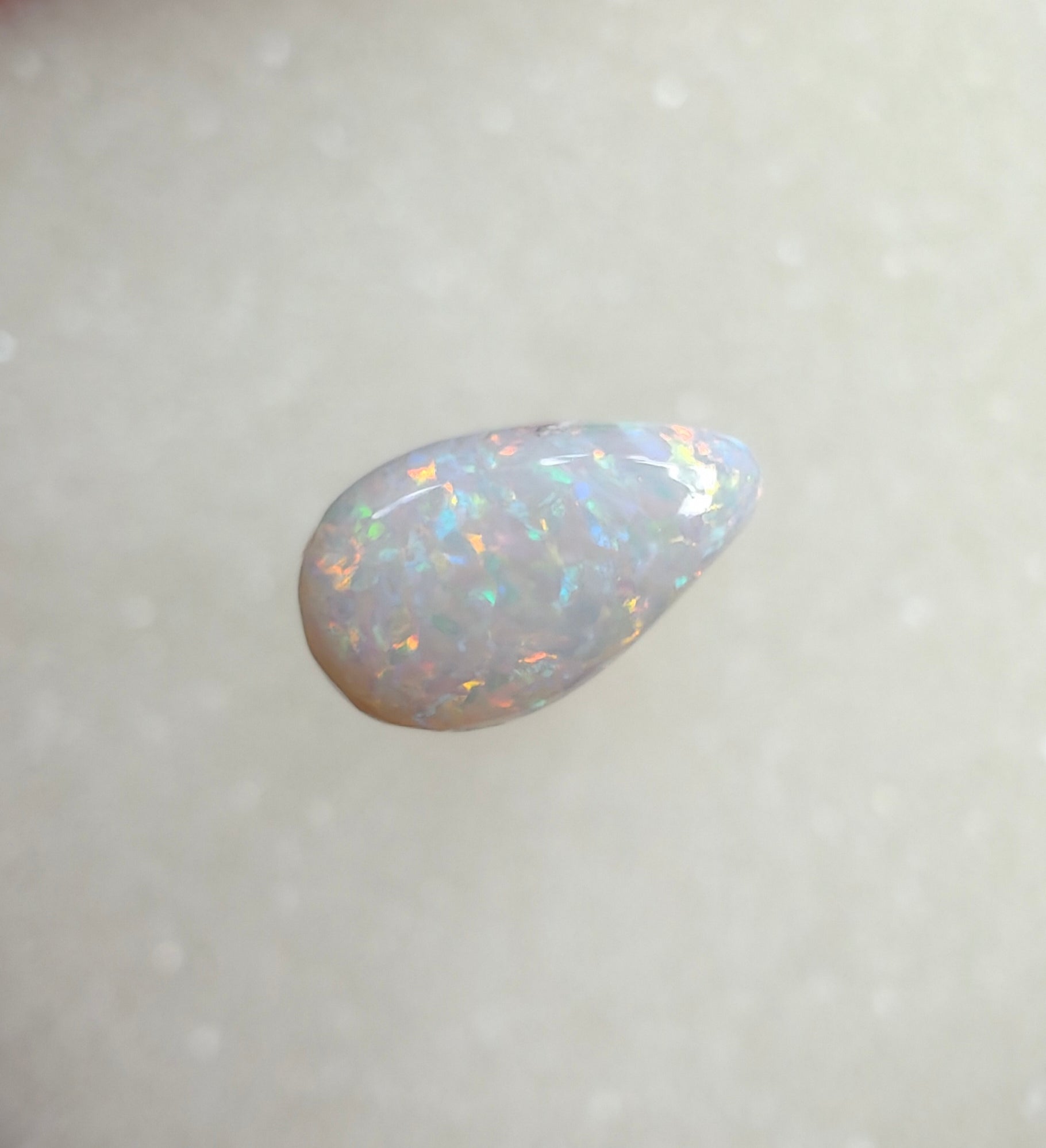 A964 - Sparkly drop cut white opal