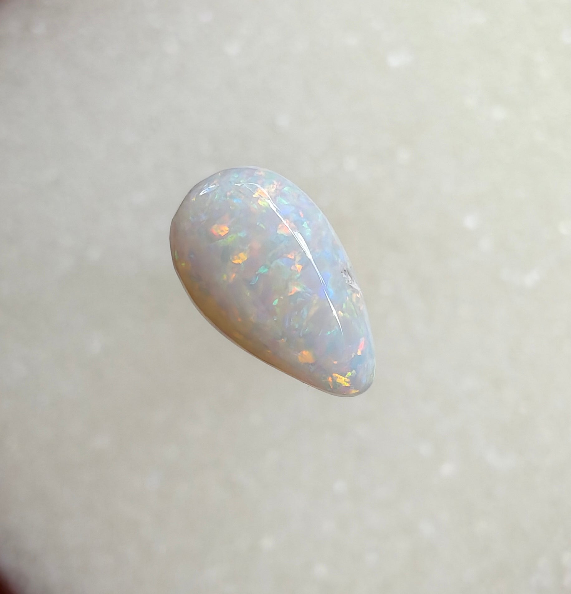 A964 - Sparkly drop cut white opal