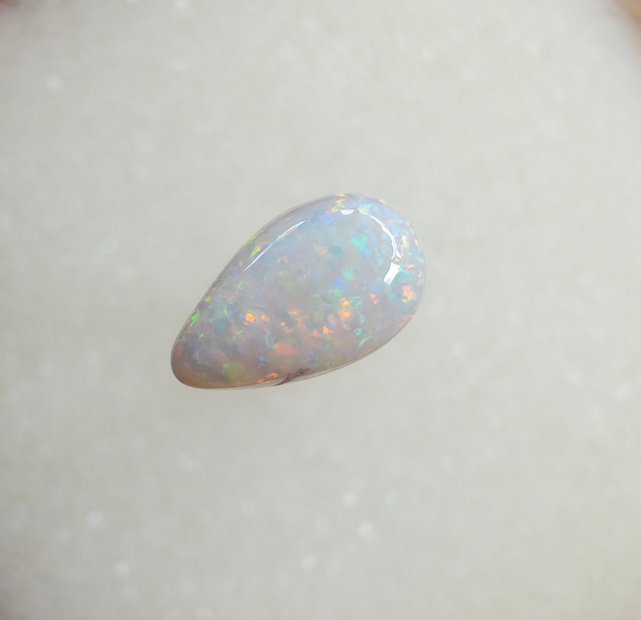 A964 - Sparkly drop cut white opal