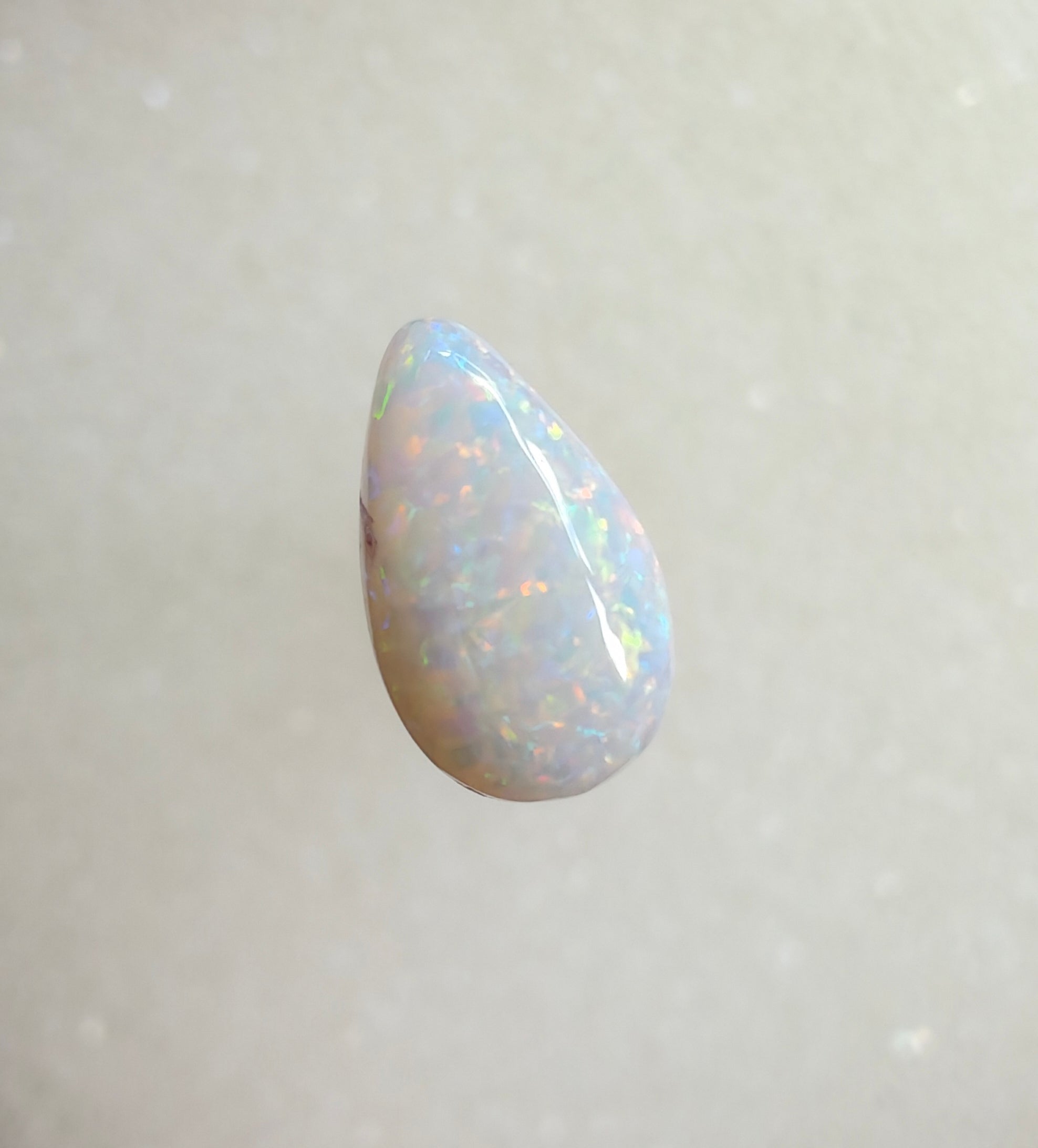 A964 - Sparkly drop cut white opal