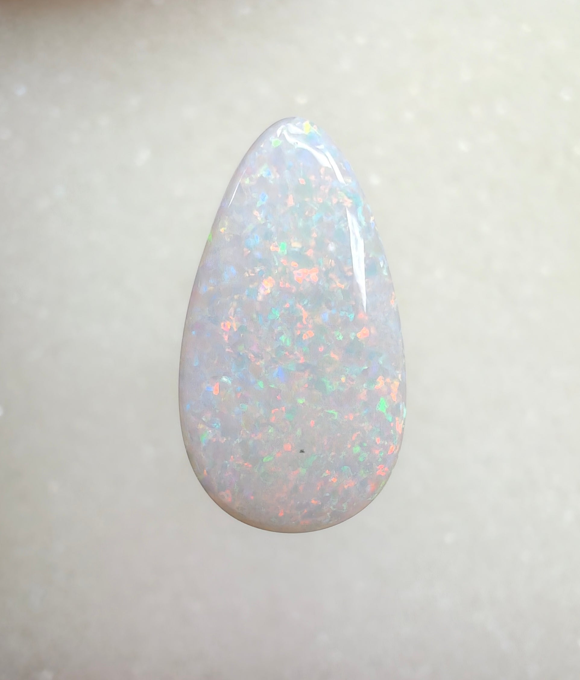 A966 - Brilliant & large drop cut white opal