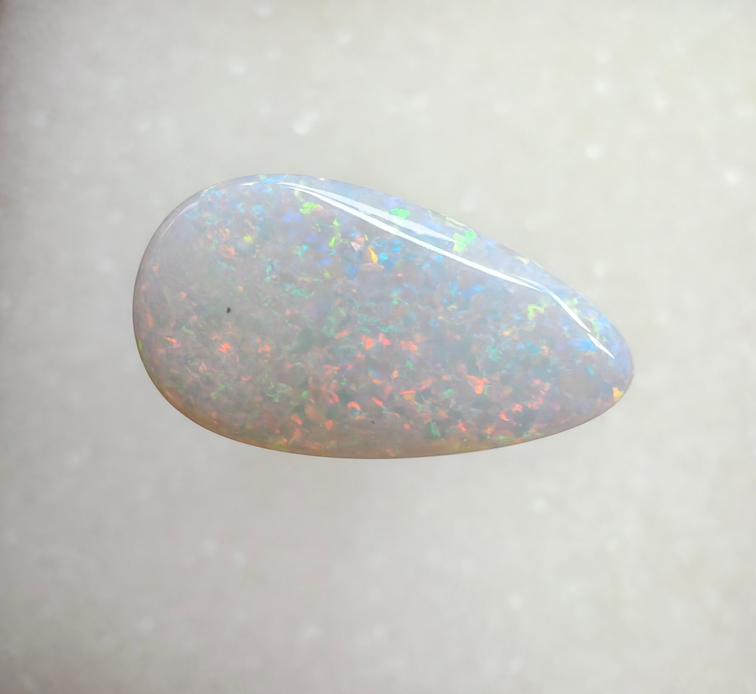 A966 - Brilliant & large drop cut white opal