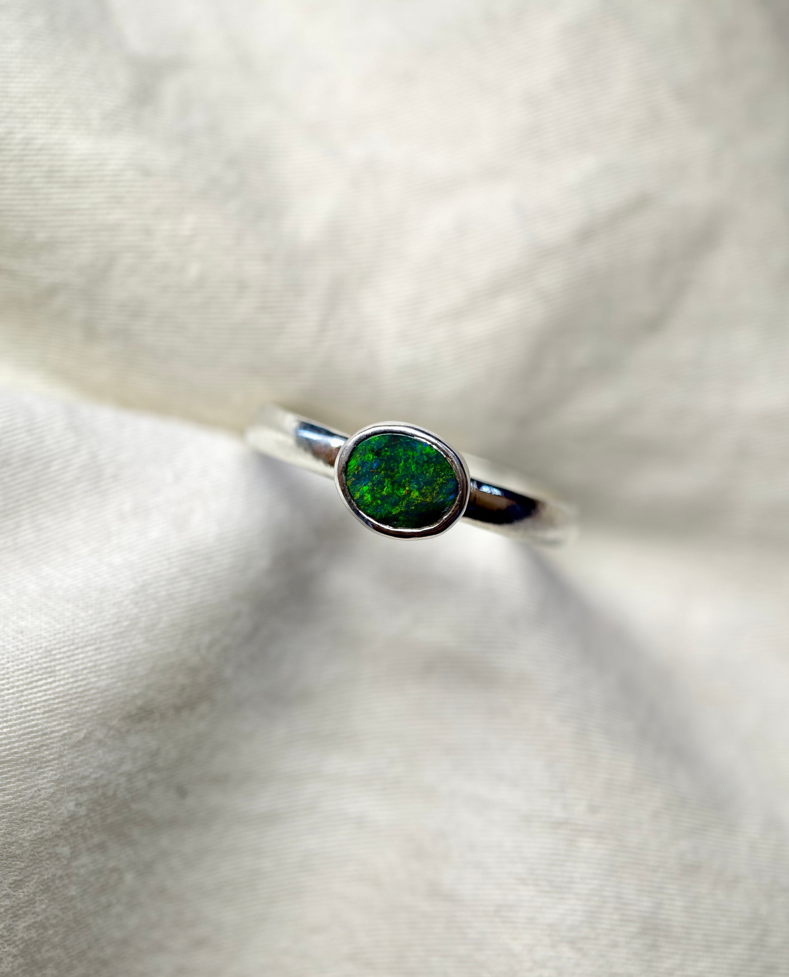 J019 - Simple bezel set black opal