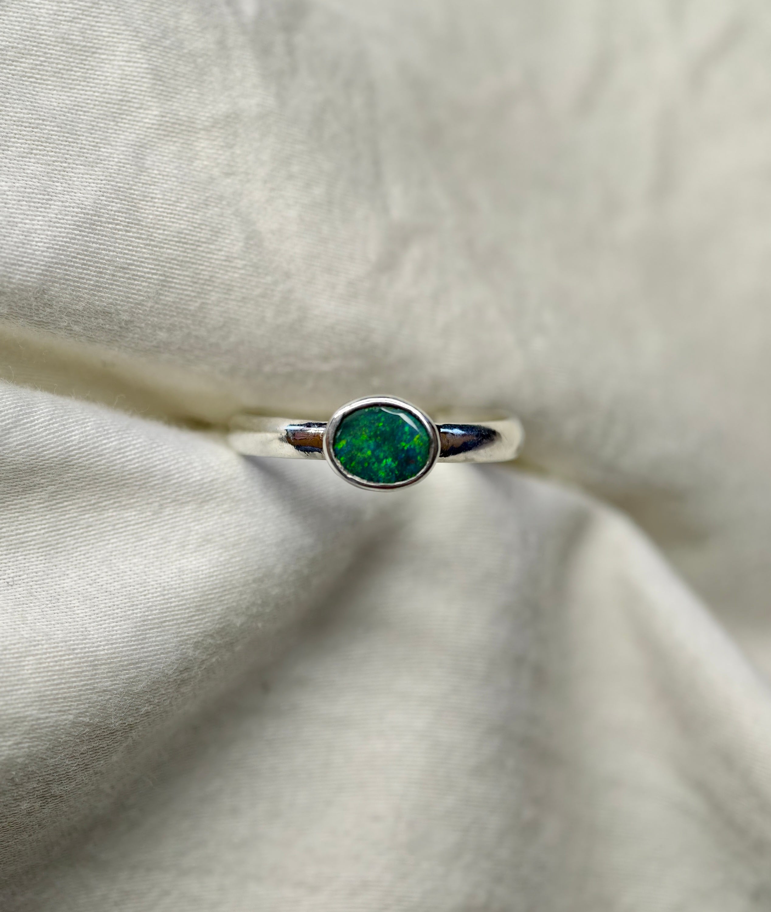 J019 - Simple bezel set black opal