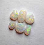 A970 - Jewellers parcel red flash white opal