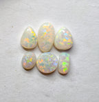 A970 - Jewellers parcel red flash white opal