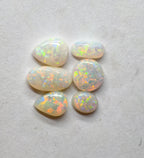 A970 - Jewellers parcel red flash white opal