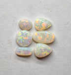 A970 - Jewellers parcel red flash white opal