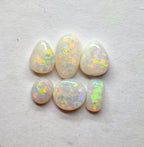 A970 - Jewellers parcel red flash white opal