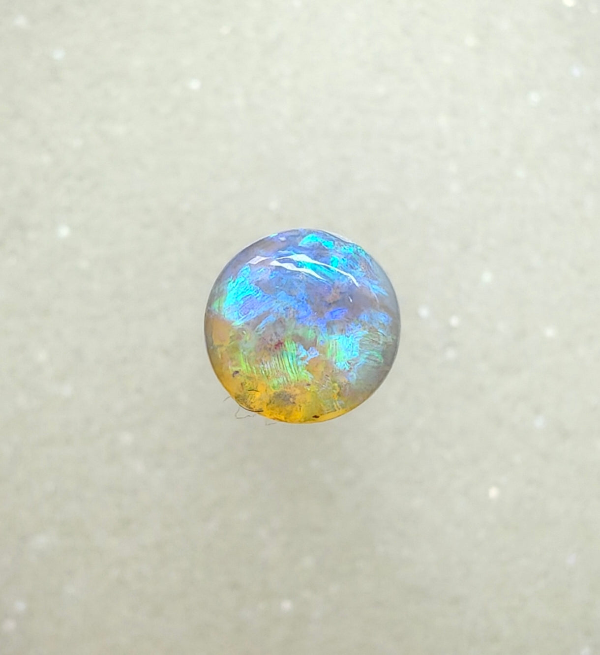 A982 - Round cut blue green crystal opal